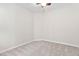 Neutral bedroom with carpet, ceiling fan, and crisp white walls; ready for your personal touch at 112 Sabiston Ct, Cary, NC 27519