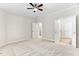 Spacious bedroom features neutral carpeting and ensuite bathroom at 112 Sabiston Ct, Cary, NC 27519