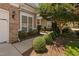 Charming home with well-maintained landscaping, including manicured shrubs and lush green lawn at 112 Sabiston Ct, Cary, NC 27519