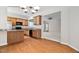 The kitchen features wooden cabinetry and granite countertops at 112 Sabiston Ct, Cary, NC 27519