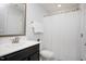 Neutral bathroom featuring a vanity, toilet, shower with curtain, and minimalist decor offering a clean space at 1125 Russet Ln, Apex, NC 27523