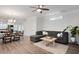 Open-concept living space with a dining area and cozy seating, bathed in natural light at 1125 Russet Ln, Apex, NC 27523