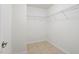 Walk-in closet featuring wire shelving and tile floor at 1148 Survada Ln, Morrisville, NC 27560