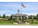 Charming community center with manicured landscaping and an American flag waving proudly at 1148 Survada Ln, Morrisville, NC 27560
