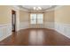Bright dining room featuring tray ceilings, hardwood flooring, and large windows at 1148 Survada Ln, Morrisville, NC 27560