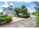 Charming home features a driveway and well-manicured landscaping at 1148 Survada Ln, Morrisville, NC 27560