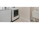 Laundry room featuring washer, dryer, and utility sink at 1148 Survada Ln, Morrisville, NC 27560