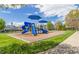 Community playground offers slides and other equipment for children at 1148 Survada Ln, Morrisville, NC 27560