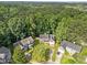 Aerial view of neighborhood featuring lush landscaping and mature trees at 120 E Laurenbrook Ct, Cary, NC 27518