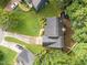 Aerial view of a home showcasing a well-manicured lawn and mature trees at 120 E Laurenbrook Ct, Cary, NC 27518