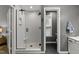 The bathroom features a tiled shower with a glass door and a separate toilet room at 120 E Laurenbrook Ct, Cary, NC 27518