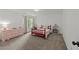 Bedroom with carpet, a bed, a desk, and lots of room at 120 E Laurenbrook Ct, Cary, NC 27518