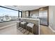 Modern kitchen with a large island, stainless steel appliances, and a breakfast bar with seating at 122 N Harrington St # 1025, Raleigh, NC 27603