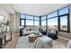 Stylish living room filled with natural light from the large windows at 122 N Harrington St # 1025, Raleigh, NC 27603
