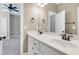 Bathroom vanity with double sink, and modern fixtures at 129 Middlegreen Pl, Holly Springs, NC 27540