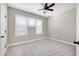 Bedroom with carpet, natural light and ceiling fan at 129 Middlegreen Pl, Holly Springs, NC 27540