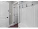 Mud room including hall tree, bench, and hooks for storage and organizing at 1313 Littlehills Dr, Apex, NC 27523