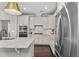 Well-equipped kitchen with granite countertops, stainless steel appliances, and ample cabinet space at 1313 Littlehills Dr, Apex, NC 27523