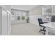 Spacious office area with wainscotting, large windows, and plenty of natural light at 1313 Littlehills Dr, Apex, NC 27523