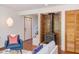 Living room featuring a brick fireplace, wood-burning stove, and cozy living space at 1409 Valley, Durham, NC 27707