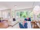 Bright living room featuring modern furnishings, natural light, and views of the outdoors at 1409 Valley, Durham, NC 27707