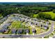 New homes in a suburban neighborhood featuring well-maintained yards and tree-lined streets at 1561 Dorsett Ln, Creedmoor, NC 27522