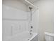Clean bathroom with a shower-tub combination and modern fixtures, offering a relaxing experience at 1561 Dorsett Ln, Creedmoor, NC 27522