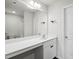 Elegant bathroom featuring a large vanity with storage and a well-lit mirror at 1561 Dorsett Ln, Creedmoor, NC 27522