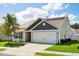Charming one-story home with a well-manicured lawn, an attached garage and a installed Solar Panels at 1561 Dorsett Ln, Creedmoor, NC 27522