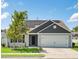 Charming one-story home with a well-manicured lawn, an attached garage and a installed Solar Panels at 1561 Dorsett Ln, Creedmoor, NC 27522