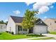Charming one-story home with a well-manicured lawn, an attached garage and a installed Solar Panels at 1561 Dorsett Ln, Creedmoor, NC 27522