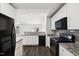Modern kitchen features stainless appliances, ample cabinet space and granite countertops at 1561 Dorsett Ln, Creedmoor, NC 27522