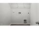 Utility room with hookups for washer and dryer plus shelving at 1561 Dorsett Ln, Creedmoor, NC 27522