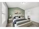 Spacious main bedroom features neutral paint and ensuite bathroom at 1561 Dorsett Ln, Creedmoor, NC 27522