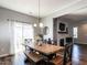 Bright dining area with wooden table, and access to living room, perfect for gatherings at 157 E Wilson St, Clayton, NC 27520
