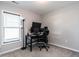 Home office with multiple monitors and a comfortable chair at 157 E Wilson St, Clayton, NC 27520