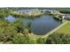 Enjoy this aerial view of a lake in a neighborhood community with walking trail at 1604 Upper Park Rd, Wake Forest, NC 27587