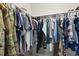 Walk-in closet with ample storage space and organized clothing racks at 1604 Upper Park Rd, Wake Forest, NC 27587
