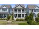 Charming two-story home with double porches and well-maintained landscaping at 1604 Upper Park Rd, Wake Forest, NC 27587
