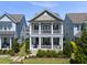 Beautiful two-story home with a inviting porch at 1604 Upper Park Rd, Wake Forest, NC 27587