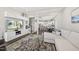 Bright, open-concept living room with hardwood floors and modern decor at 1604 Upper Park Rd, Wake Forest, NC 27587