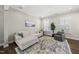 Spacious living room filled with natural light, featuring stylish furniture at 1604 Upper Park Rd, Wake Forest, NC 27587