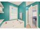 Bathroom featuring a large white soaking tub, large window, and access to the shower at 1617 Heritage Garden St, Wake Forest, NC 27587