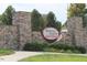 Entrance to Heritage Station, highlighting local shopping, featuring stone walls and landscaping at 1617 Heritage Garden St, Wake Forest, NC 27587