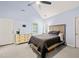 Comfortable main bedroom with high ceilings, carpeted floor, and well-lit window at 1617 Heritage Garden St, Wake Forest, NC 27587