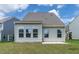 View of home's back exterior and back yard at 1745 Ripley Woods St, Wake Forest, NC 27587