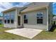 Backyard view with a concrete patio and exterior siding at 1745 Ripley Woods St, Wake Forest, NC 27587