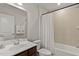 Well-maintained bathroom featuring a shower-tub combination and stylish fixtures at 1745 Ripley Woods St, Wake Forest, NC 27587