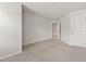 Spacious bedroom featuring neutral carpet, fresh paint, and ample natural light at 1745 Ripley Woods St, Wake Forest, NC 27587
