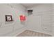 This walk-in closet boasts wire shelving and carpeted floors, offering ample storage space at 1745 Ripley Woods St, Wake Forest, NC 27587